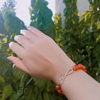 Bracelets fait main, motif infini avec perles semi précieuses's image