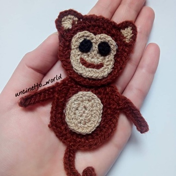 Monkey porte clés en bordeau et beige's image